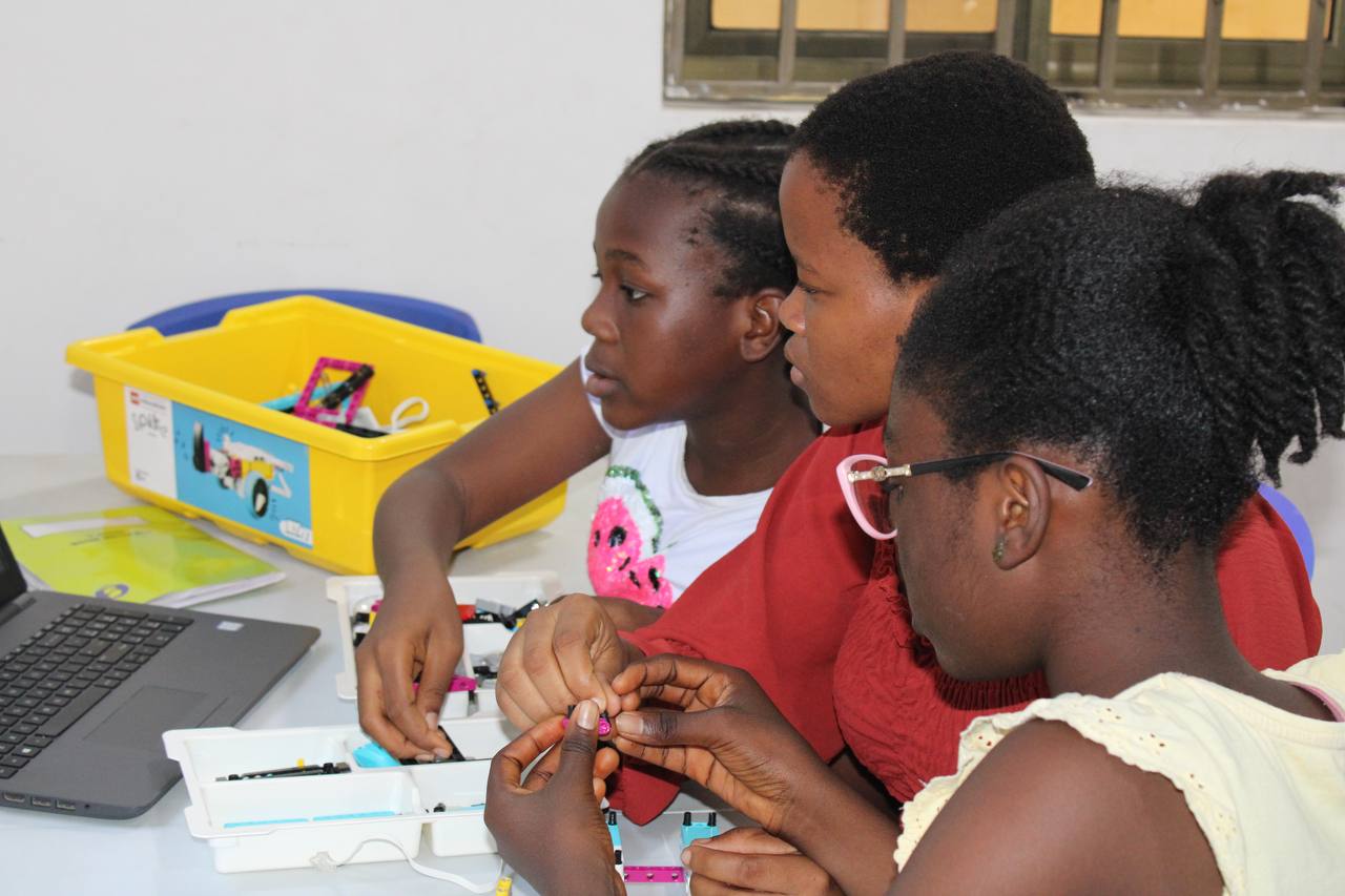 African students engaged in hands-on STEM learning with robotics and technology